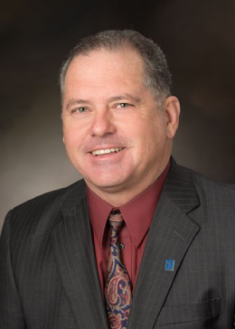 Ira Smith, Auctioneer and Real Estate Broker