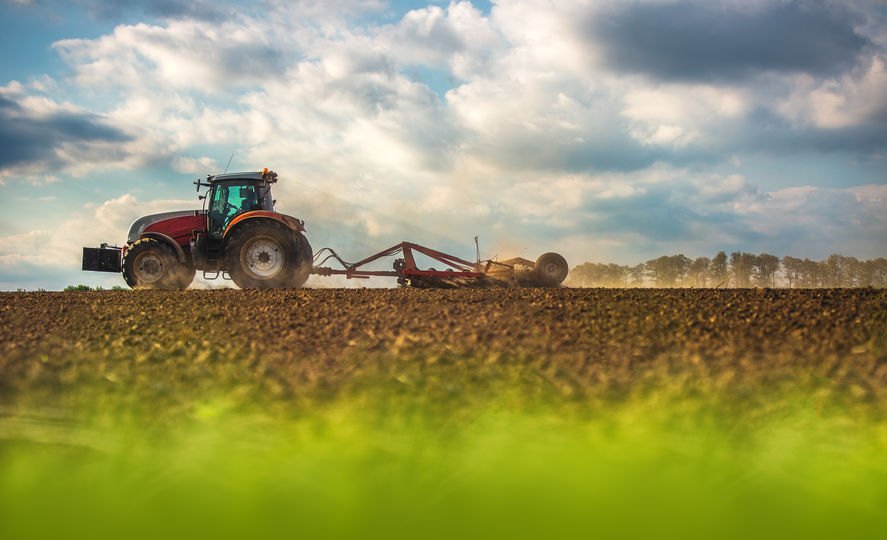 Tractor Plowing Scenic Farm Field in Woodward, OK